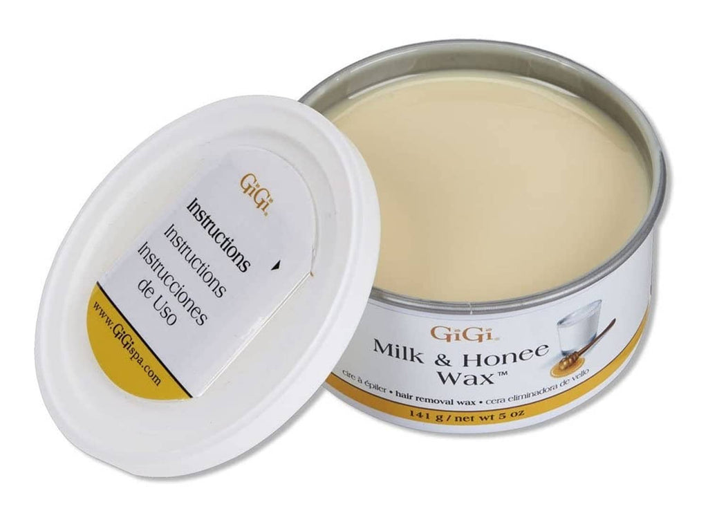 Opened Milk and Honnee wax tub with cream wax inside and white lid