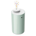 Mint green waterless essential oil diffuser with white lid and central nozzle