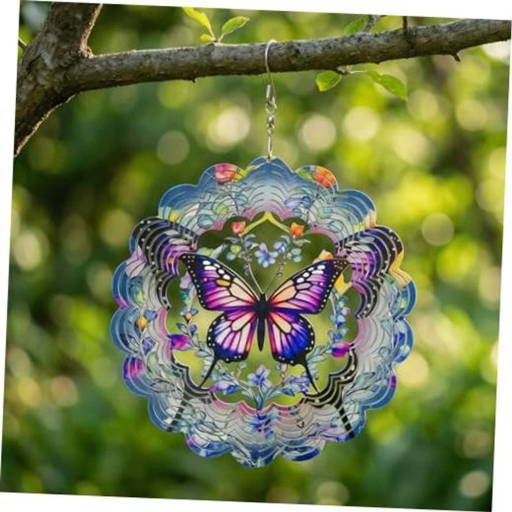 Colorful metal butterfly wind spinner with circular layered cutouts, hanging from a chain.
