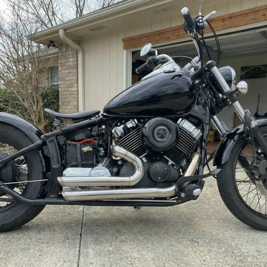 Motorcycle staggered exhaust pipe set in chrome finish with mufflers and brackets