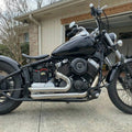 Motorcycle staggered exhaust pipe set in chrome finish with mufflers and brackets
