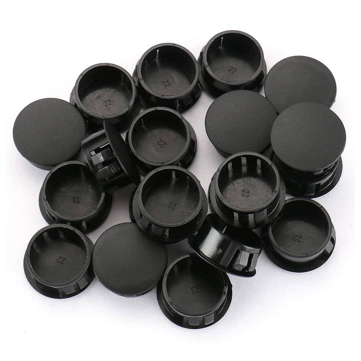 Set of black round plastic locking hole plug covers in assorted pieces