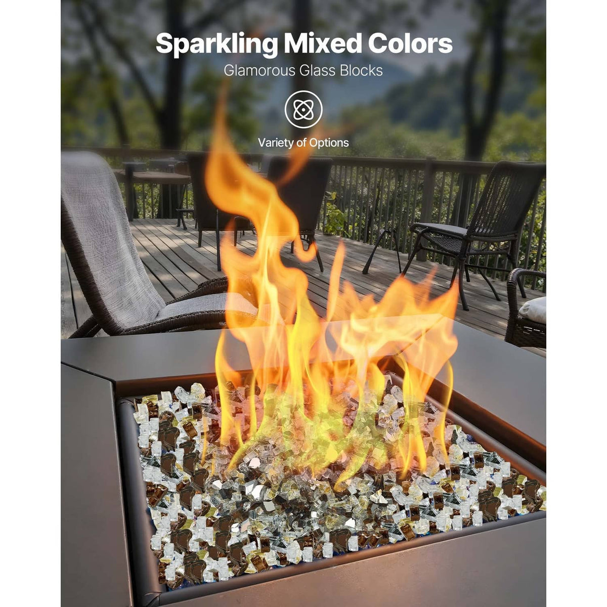 Fire pit burner with flames and mixed clear, copper, and gold glass rocks inside