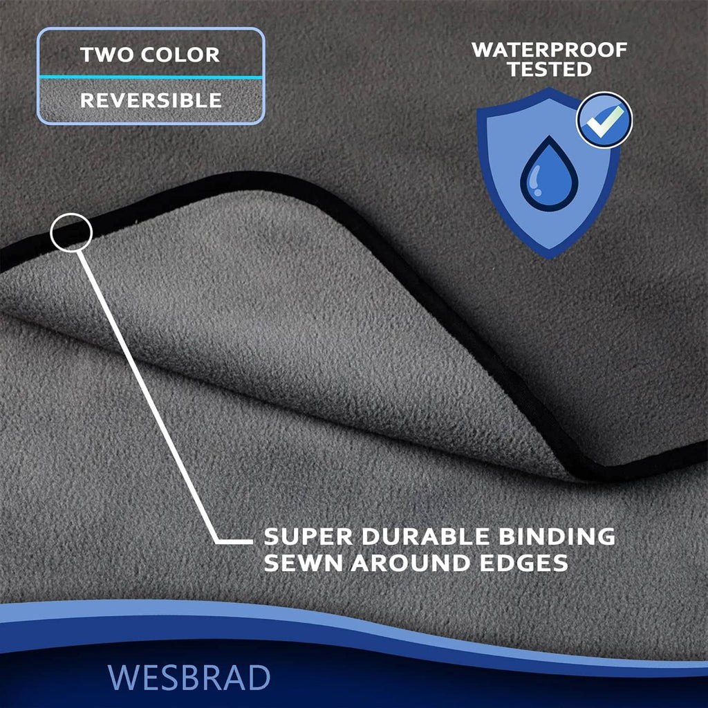 Gray waterproof bed cover fabric with stitched binding edge and water-splash icon