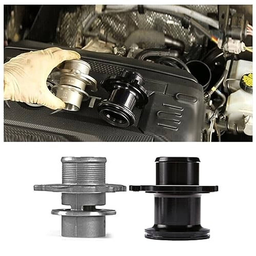 Turbo muffler delete pipe installation showing black adapter components in an engine bay