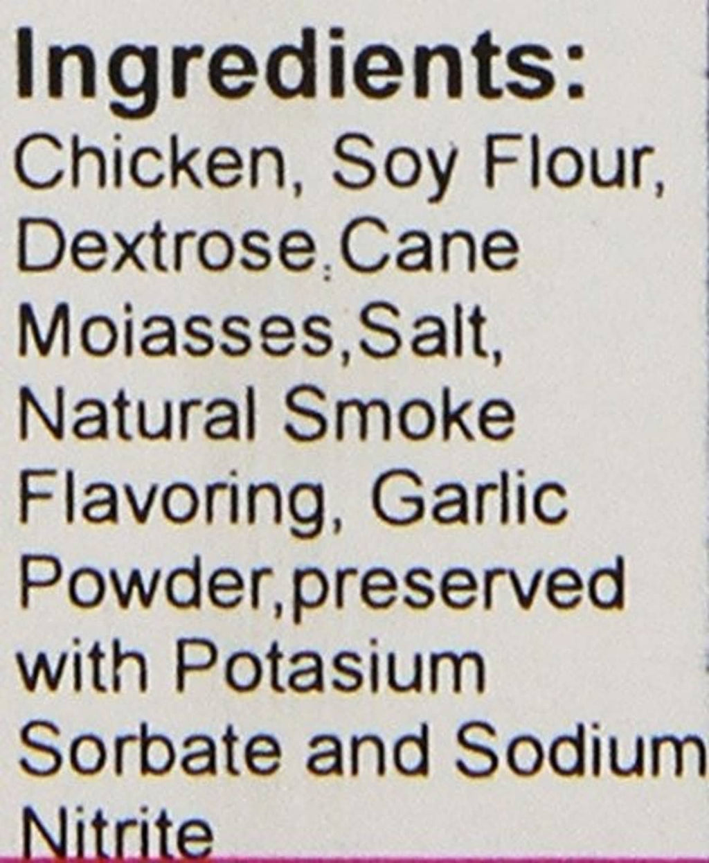Dog treat label close-up: ingredients include chicken, soy flour, garlic powder