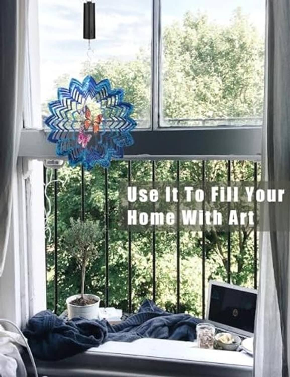 Black hanging disco ball motor with blue mandala-style hanging light