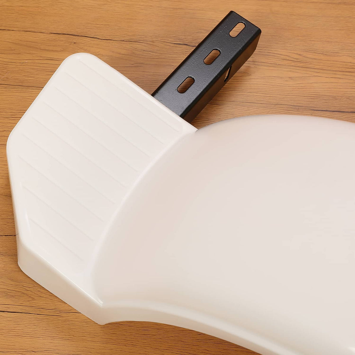 White HDPE fender end cap with black metal bracket and mounting holes