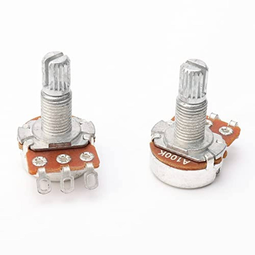 Two electric guitar potentiometers shown from front with metal split shaft and terminal pins