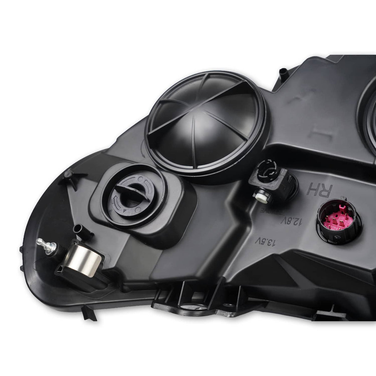 Headlight rear housing with circular bulb openings and wiring connectors
