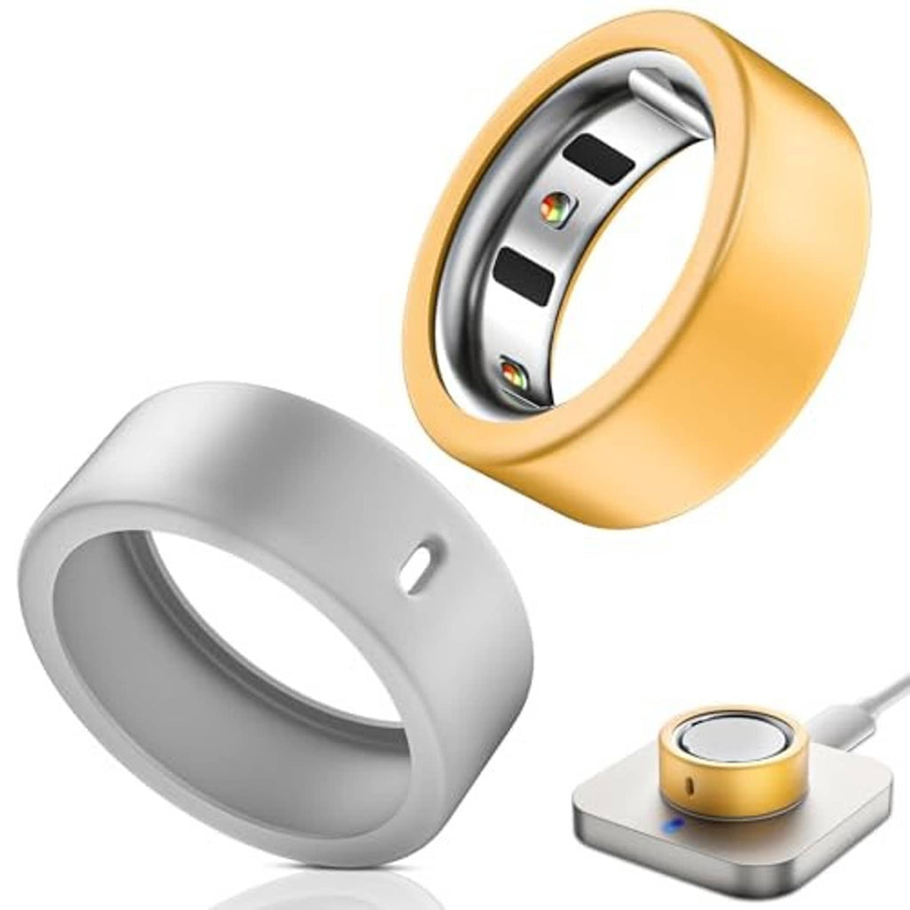 Smart ring silicone cover set with gold and silver sleeves, shown with charger base