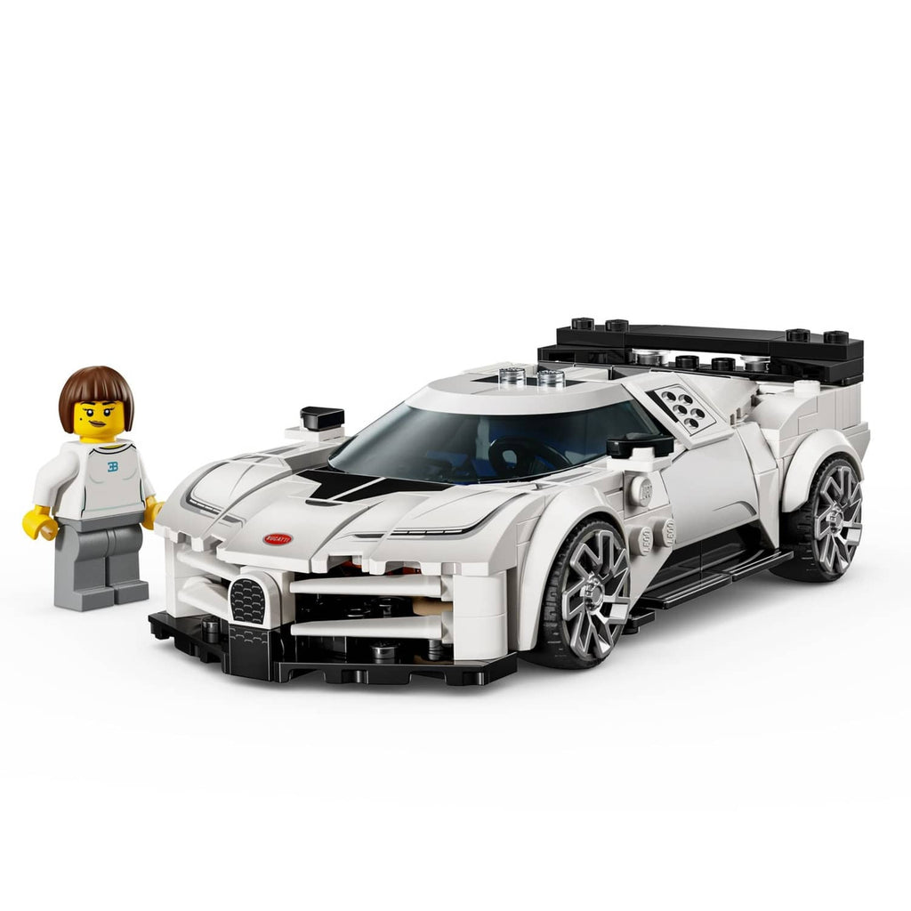 White and black LEGO toy sports car model with minifigure accessory