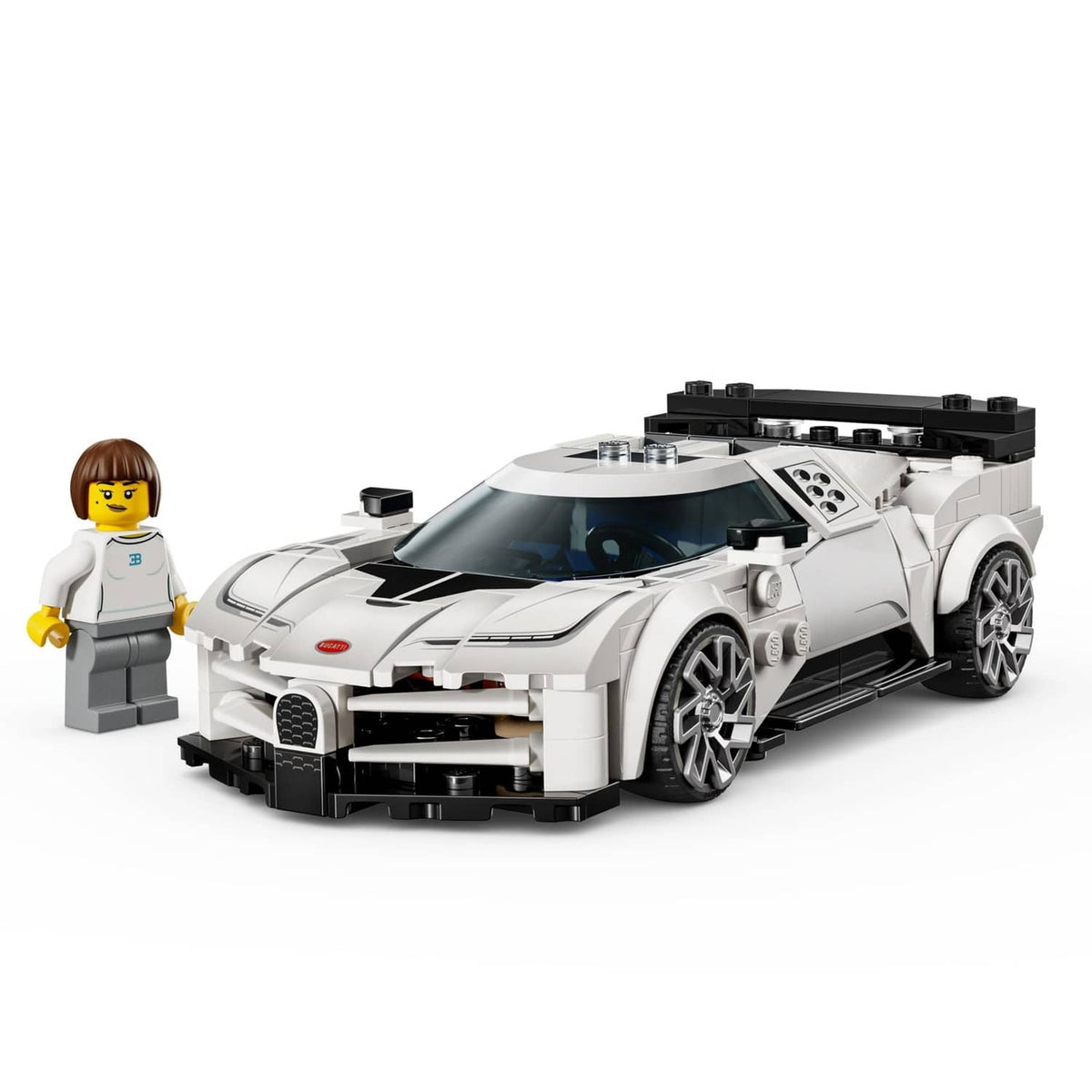 White and black LEGO toy sports car model with minifigure accessory