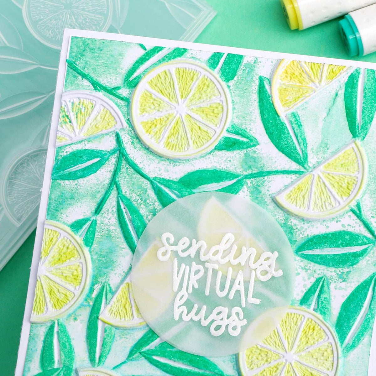 Embossed lemon slice and leaf pattern card with circular message sticker