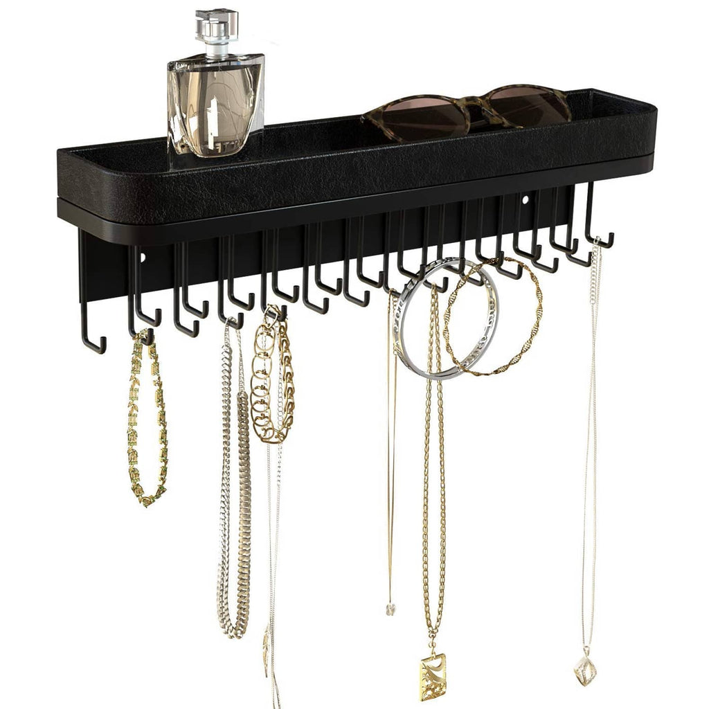 Black wall-mounted necklace organizer with hanging hooks and long top bar tray