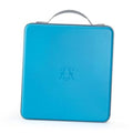 Sky blue hard plastic CD case organizer with carry handle, flat square design.