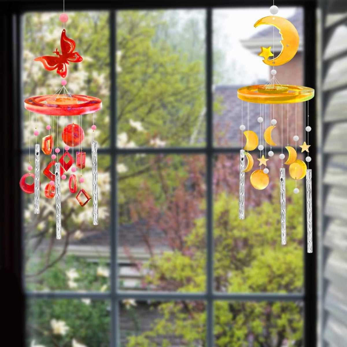 Red and yellow hanging moon wind chime set with sparkling charm details