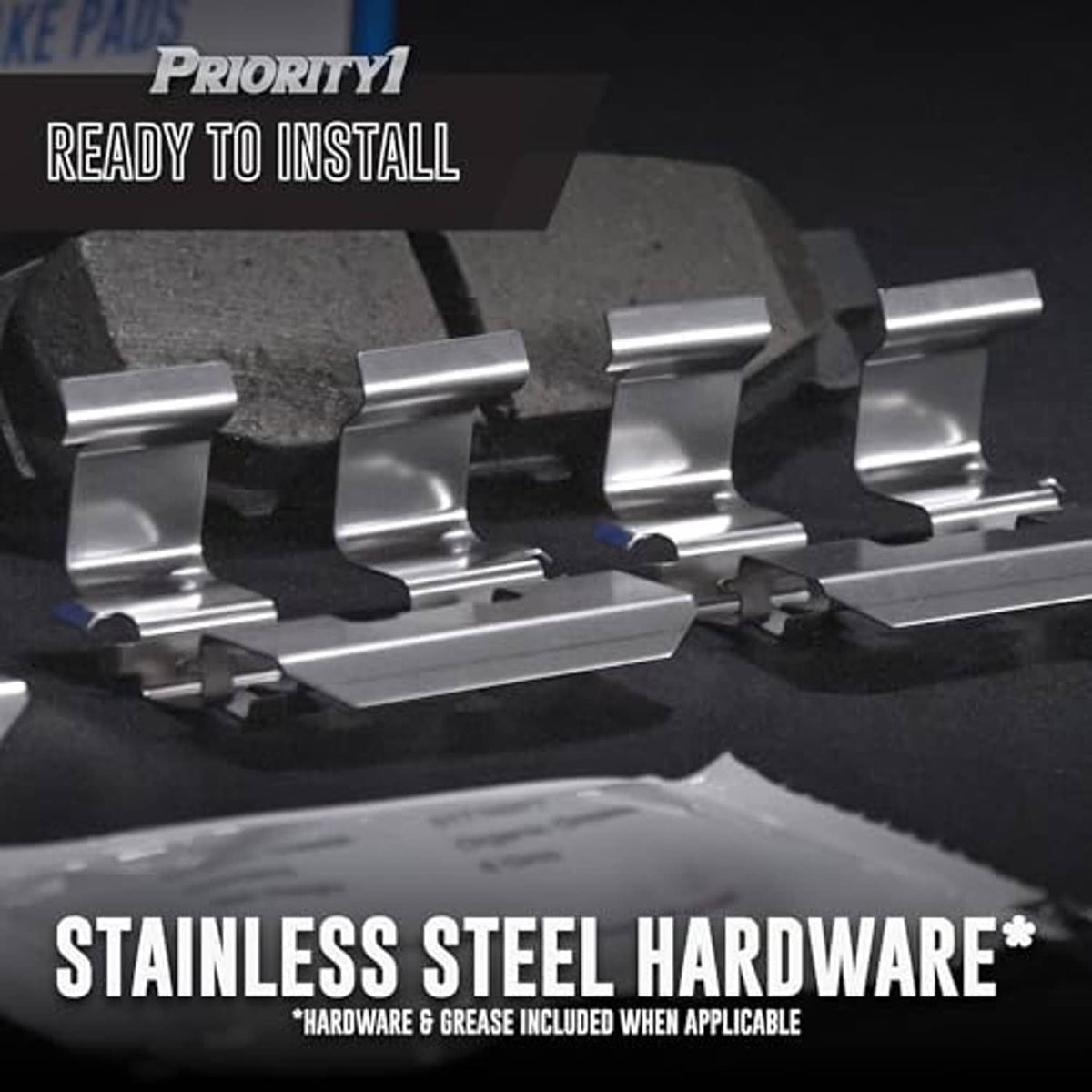 Stainless steel brake pad hardware and shims shown with included grease
