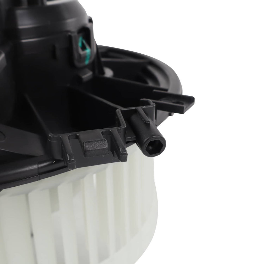 A/C heater blower motor with black plastic housing and electrical connector