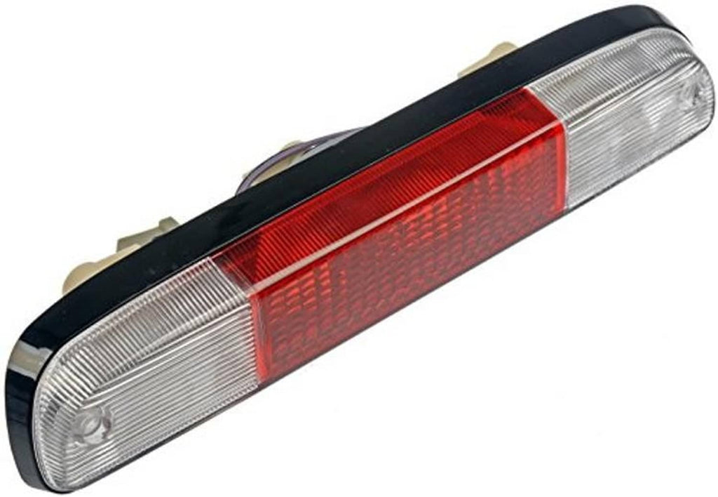Center high mount stop light with red reflector band and clear outer lenses, black rim