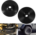 Black coil spring spacer discs, two round units with center mounting holes