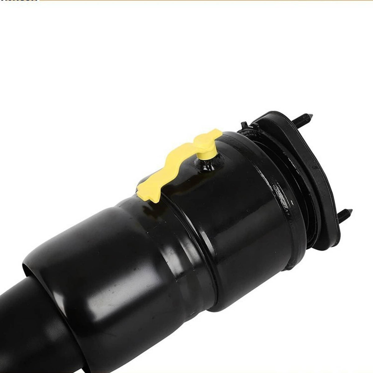 Detail view of black air suspension strut with yellow cap on top and side mounting tab