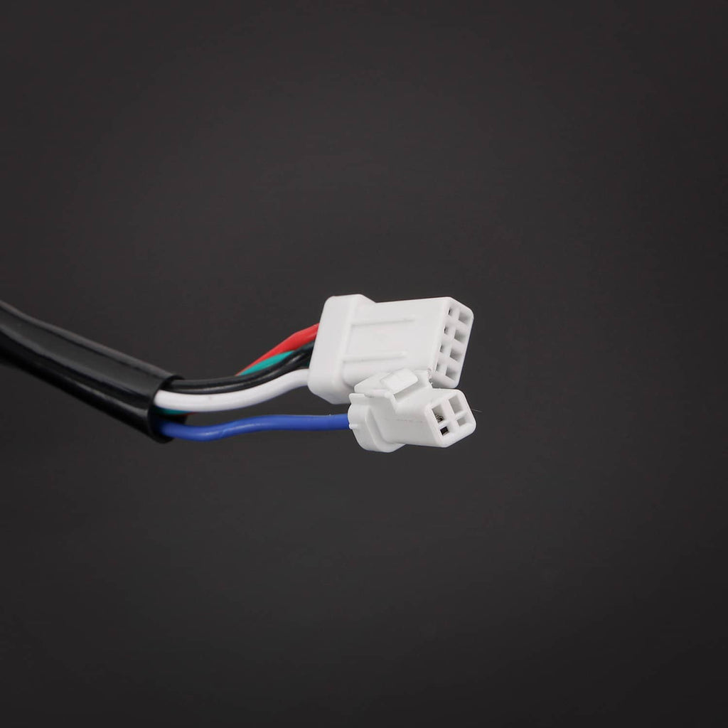 Close-up of pre-wired handlebar harness with white connector and colored wires