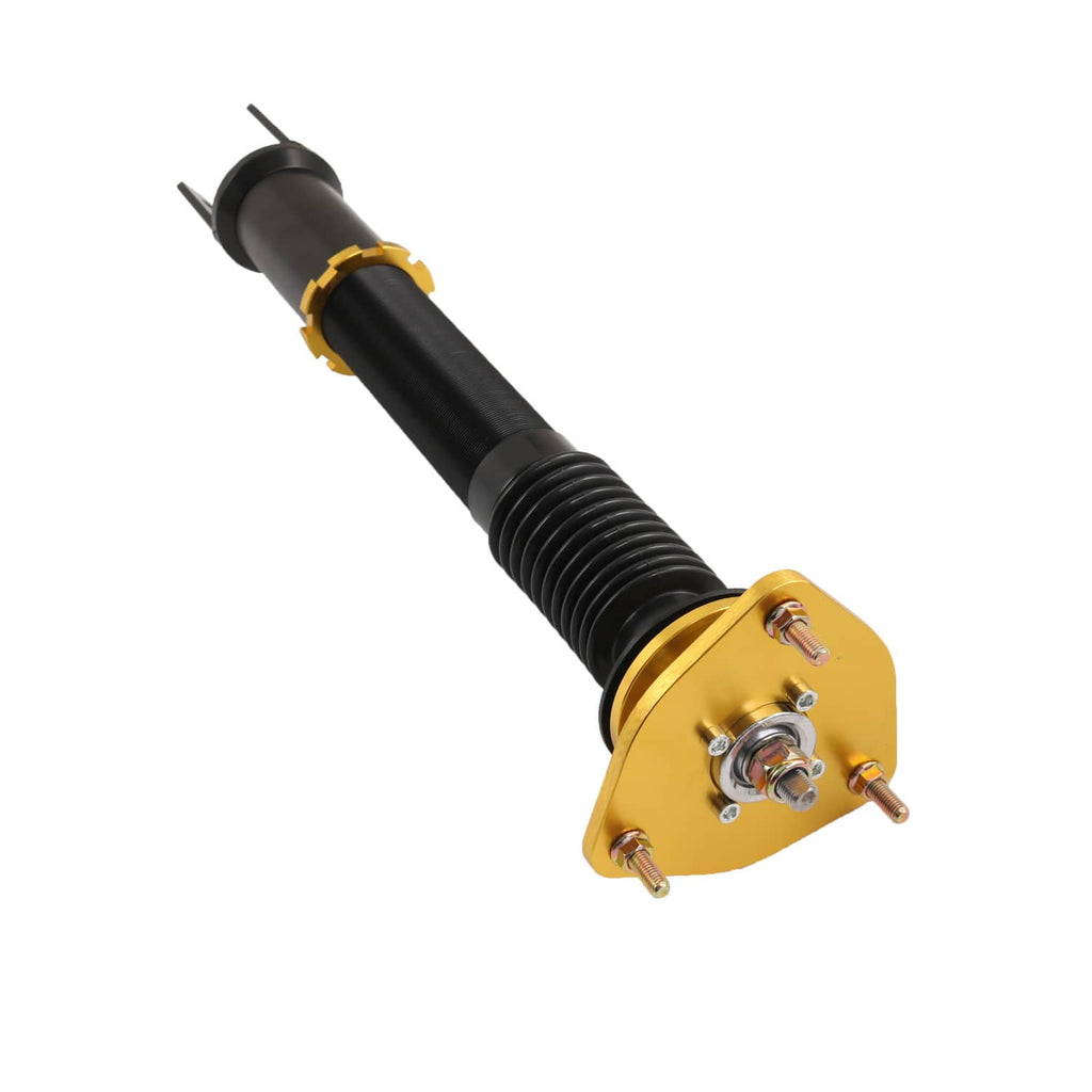 Coilover shock absorber with black body and gold mounting plate