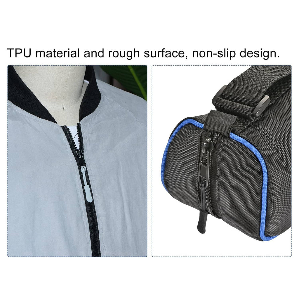 Black textured zipper pull tab with red cord, shown on a zipper track