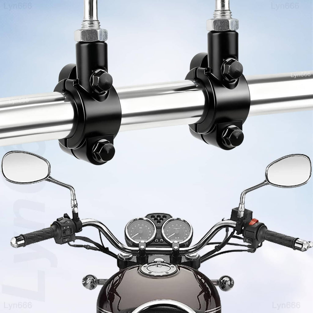 Pair of black mirror mount clamps on motorcycle handlebars with mirror stems attached
