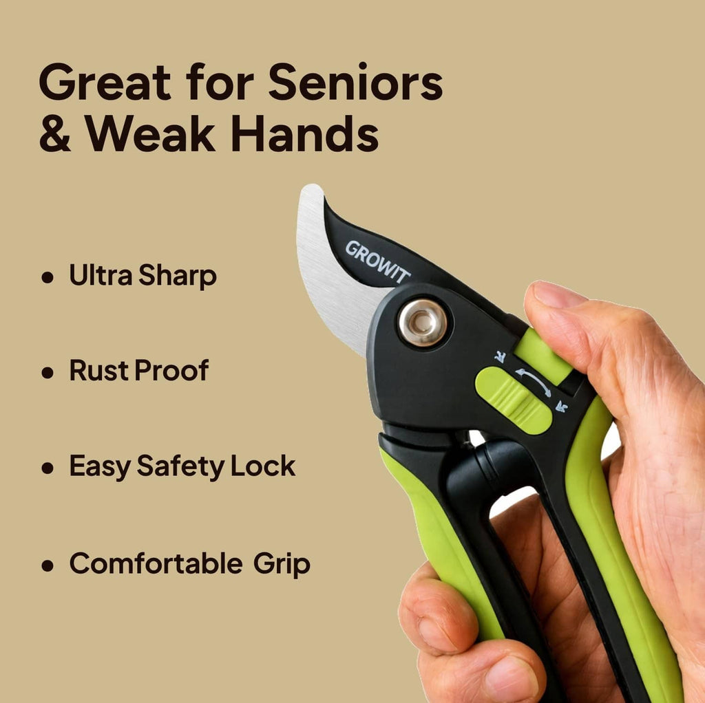 Green and black bypass pruning shears with loop safety cord, held in hand