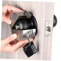 Door knob lock with black numeric keypad and metal shield, shown mounted on a door