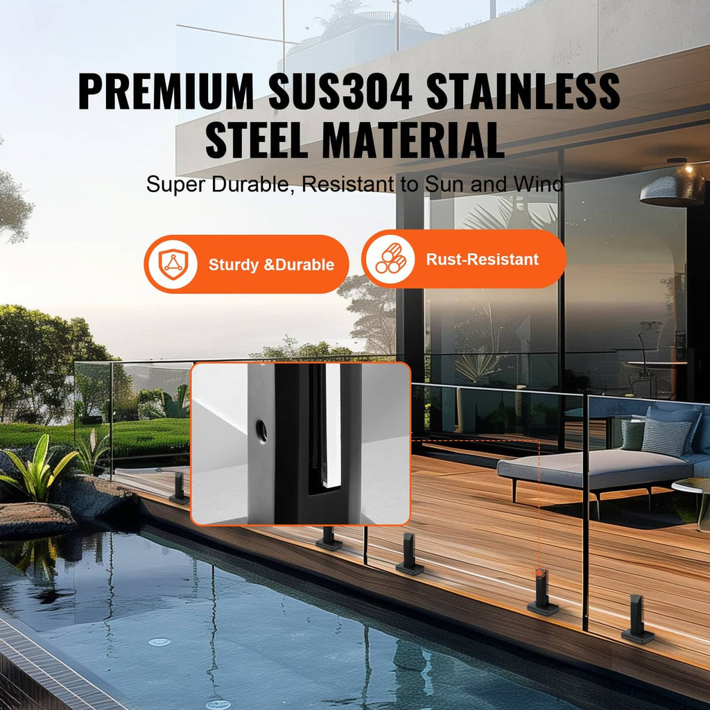 Black square floor clamp holding vertical glass on a railing