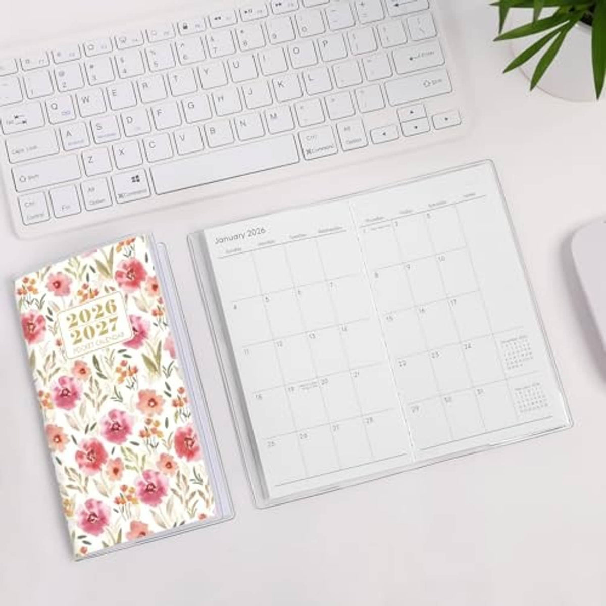Floral pocket calendar with open monthly grid planner page