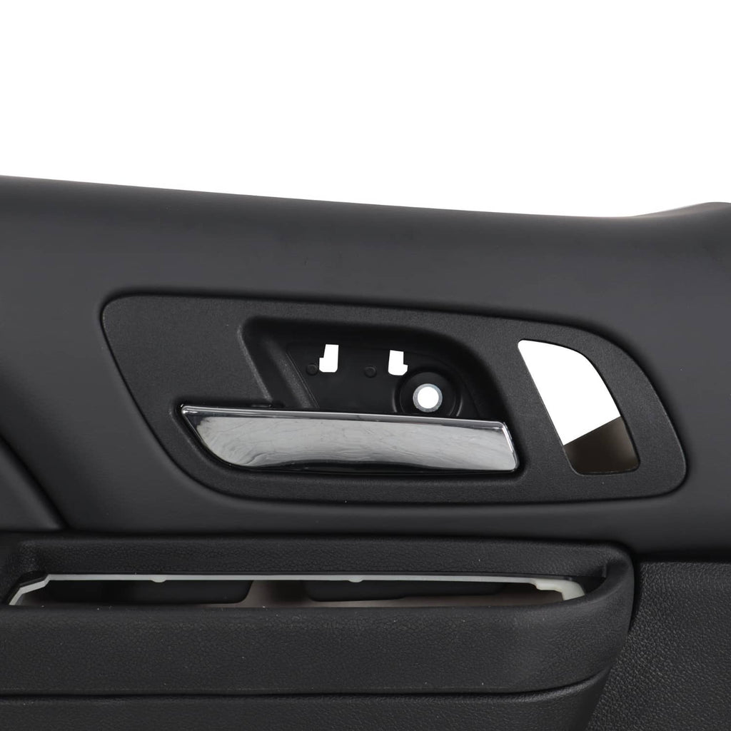 Close-up of black interior door handle recess and control opening.