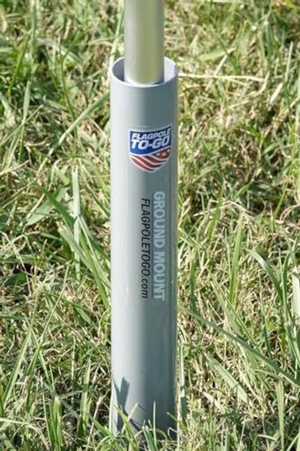 Silver ground flagpole mount pole with FLAGPOLE TO-GO label and vertical branding