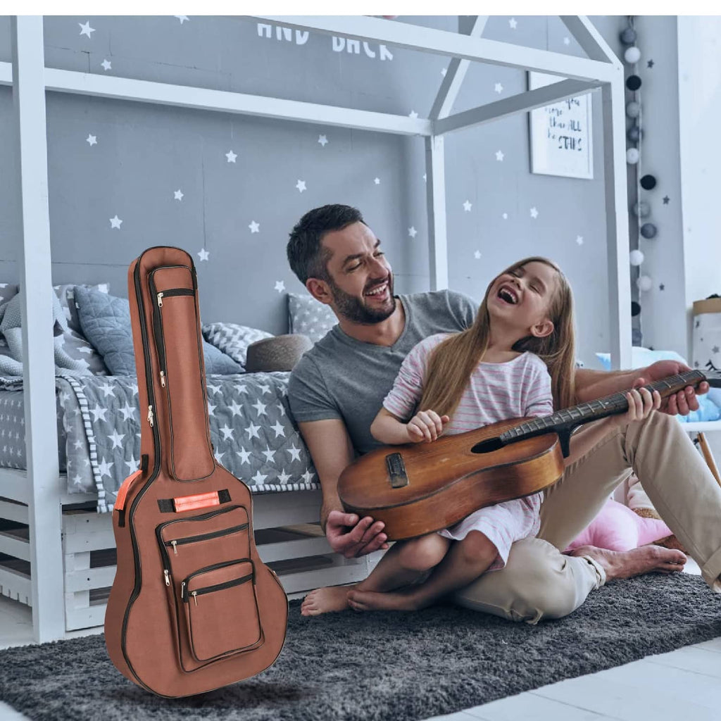 Brown acoustic guitar bag with padded neck support, front pockets, and hanging loop.