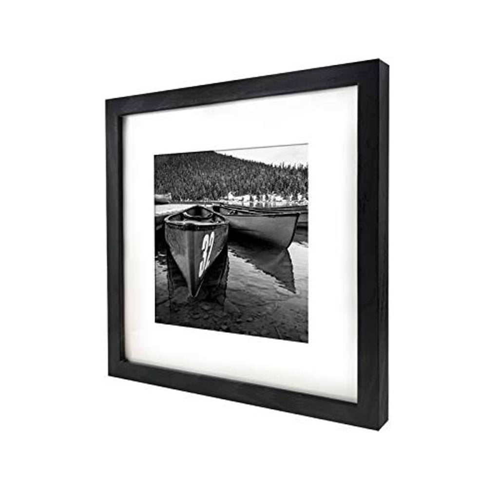 Black 12x12 picture frame with white mat holding a small landscape photo.