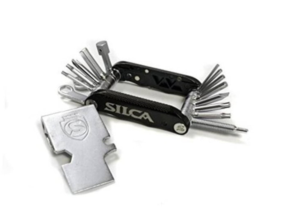 SILCA multi-tool with black handle, open tools, hex keys, and wrench blade attachment