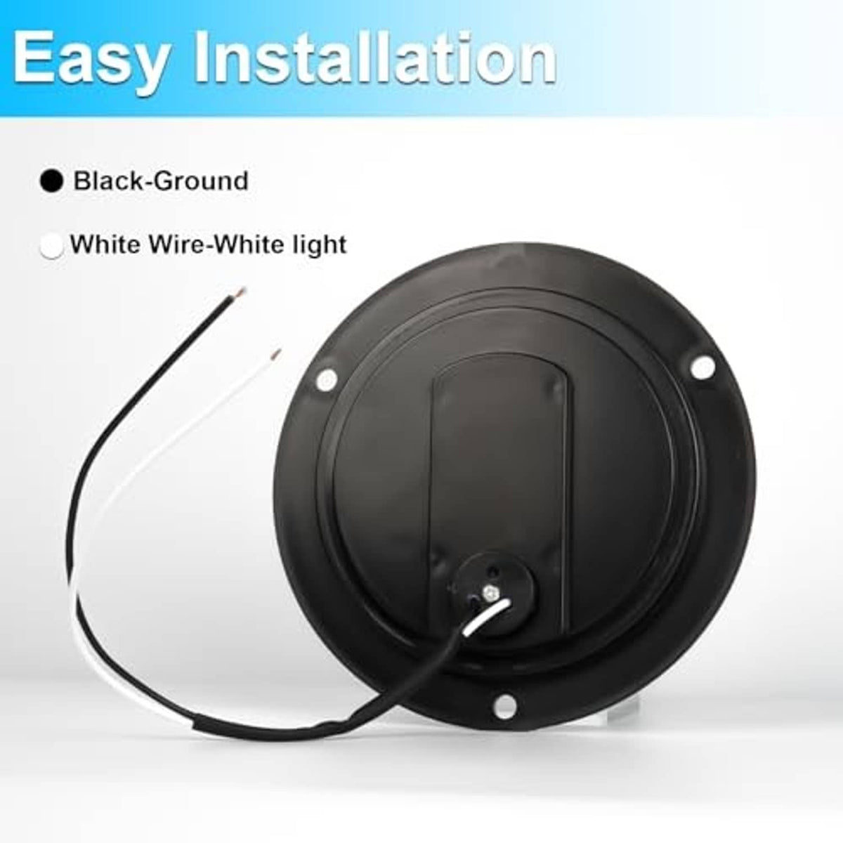 Back view of round LED trailer tail light with wiring leads and mounting holes in black housing