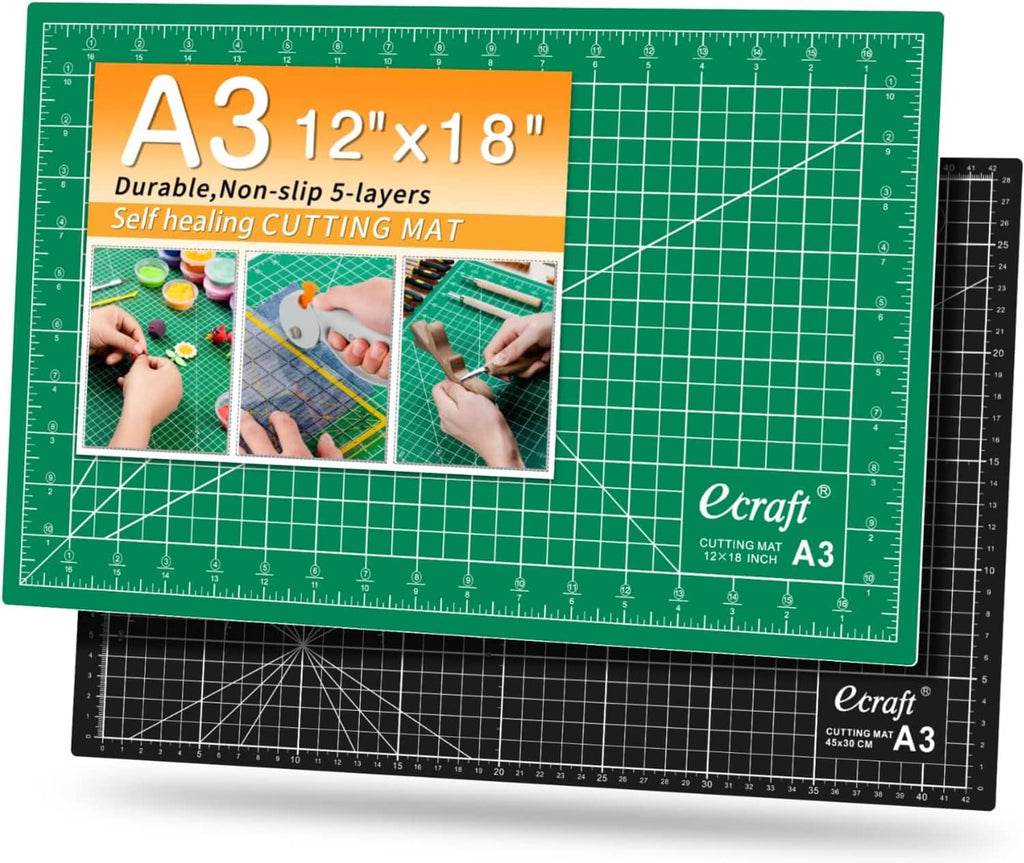 Green and black cutting mat set with white grid markings and 12x18 in format