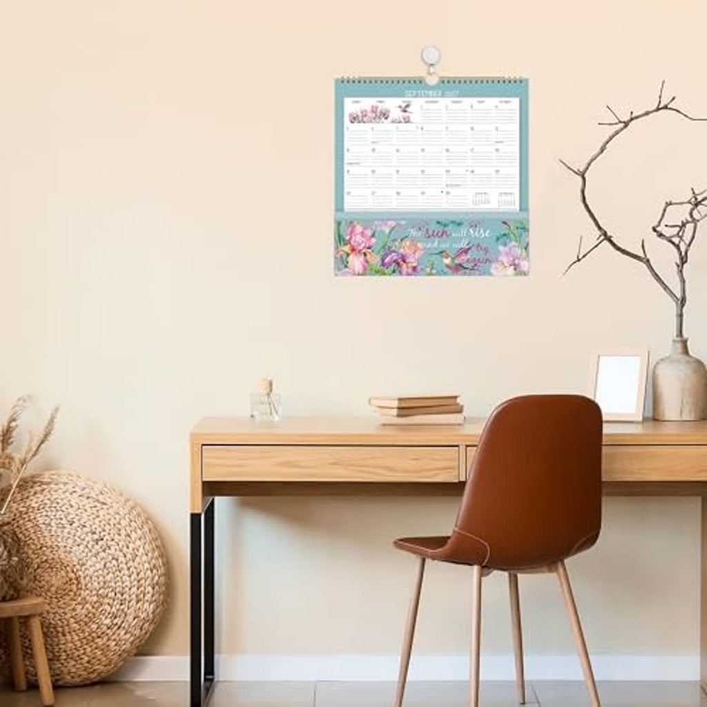 2026–2027 wall calendar hanging on wall with floral design and monthly grid