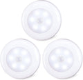 Set of three white LED motion sensor puck lights with built-in light sensor