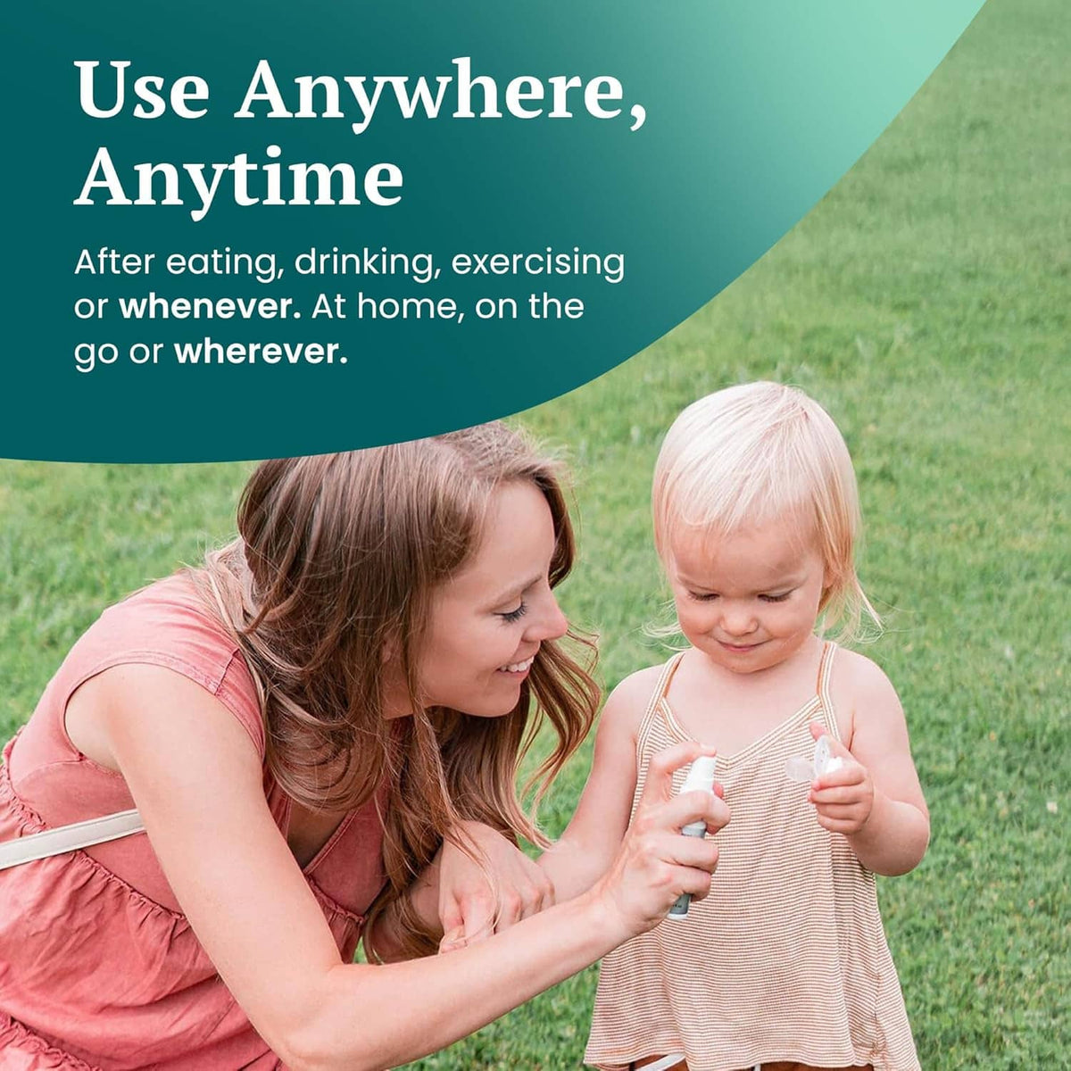 Smilesaver spray cleaner in hand used with a child for oral device care