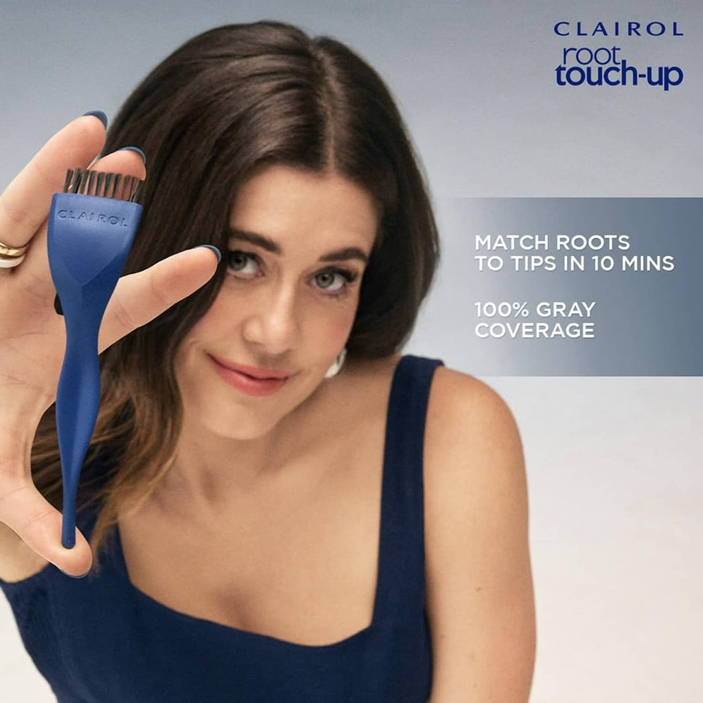 Clairol root touch-up applicator brush applying color along the part line
