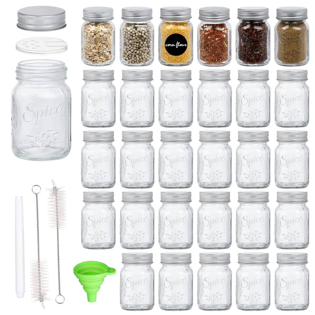 Clear glass mason spice jars set with silver lids and empty jar inserts