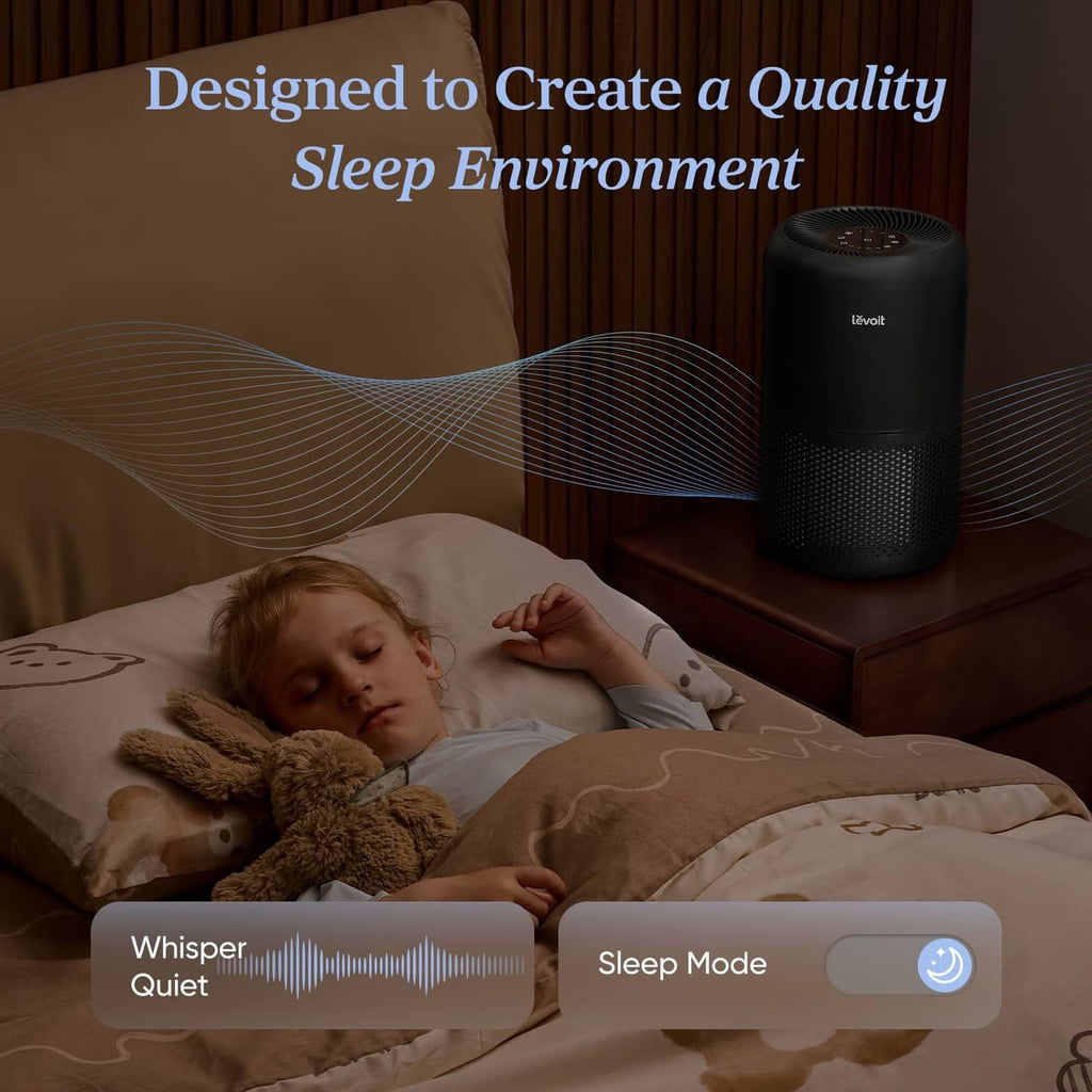 Black air purifier on a bedside table with sleep mode and whisper quiet graphic