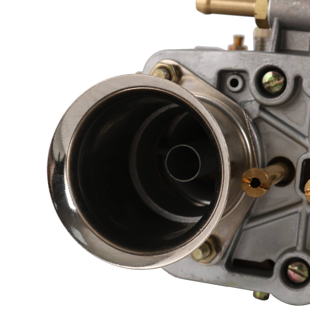Carburetor intake throat close-up with circular inlet opening on cast housing