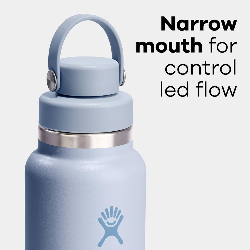 Insulated stainless steel water bottle with narrow mouth and blue lid, compact close-up.
