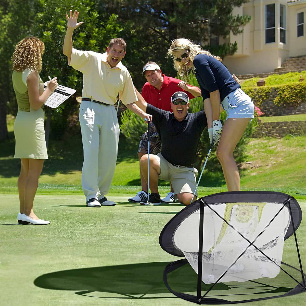 Round SAPLIZE golf chipping net with neon target panel on outdoor practice mat